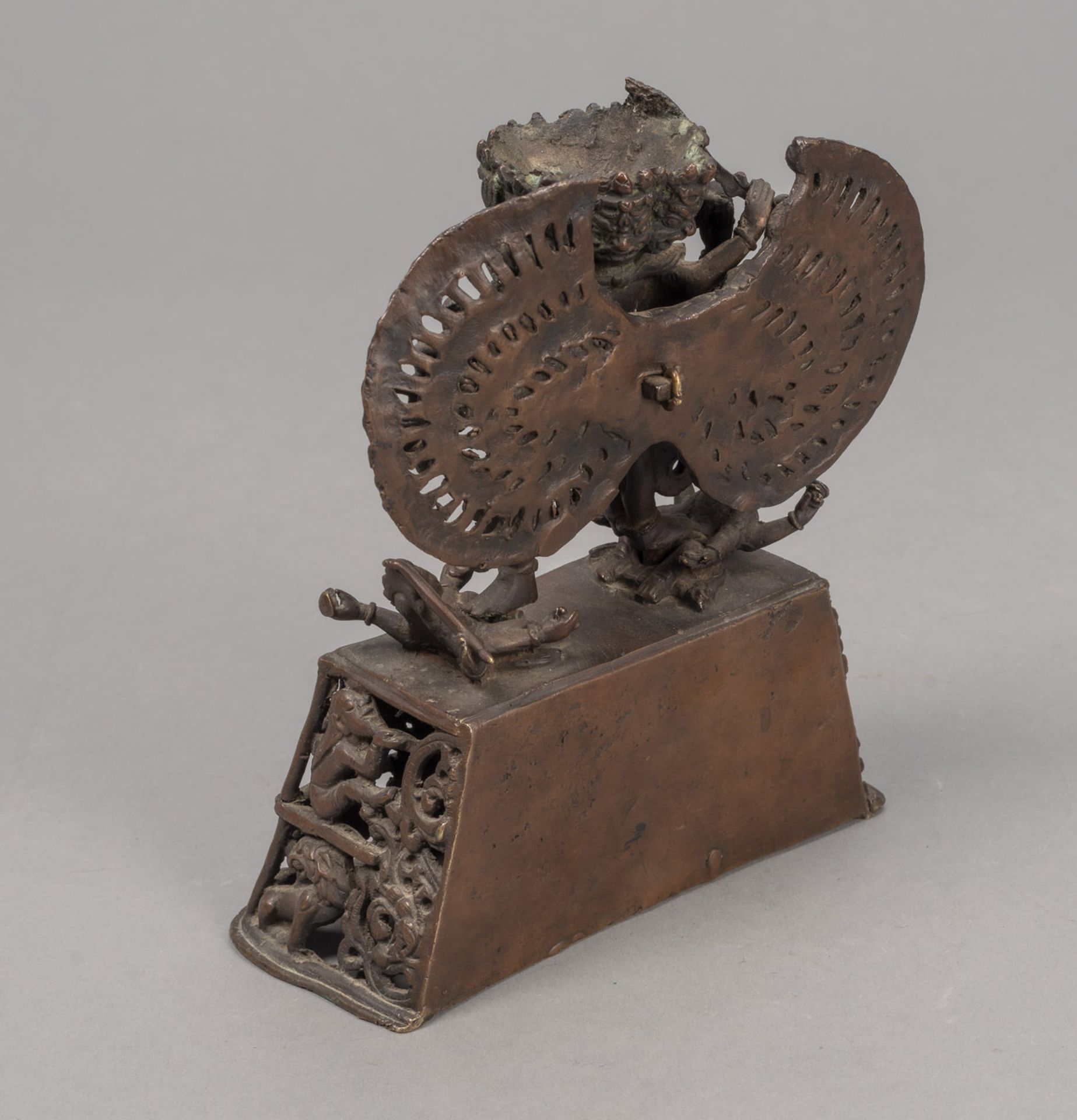 A BRONZE FIGURE OF A TANTRIC DEITY IN YAB-YUM ON AN OPENWORK PEDESTAL - Image 3 of 4