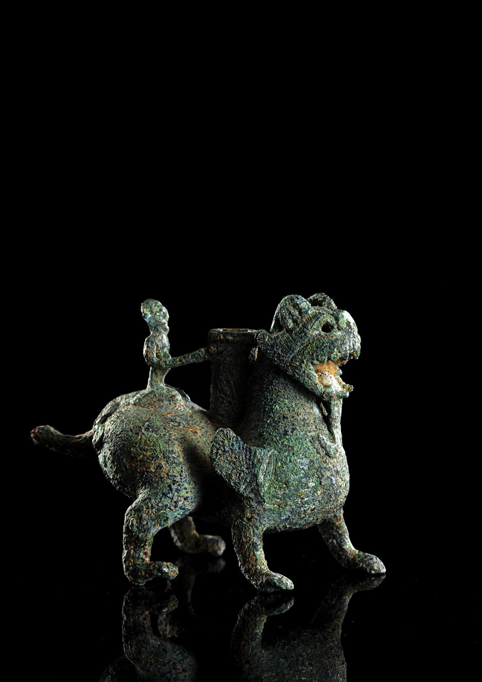 A SMALL RARE BRONZE CHIMERA-FORM VESSEL