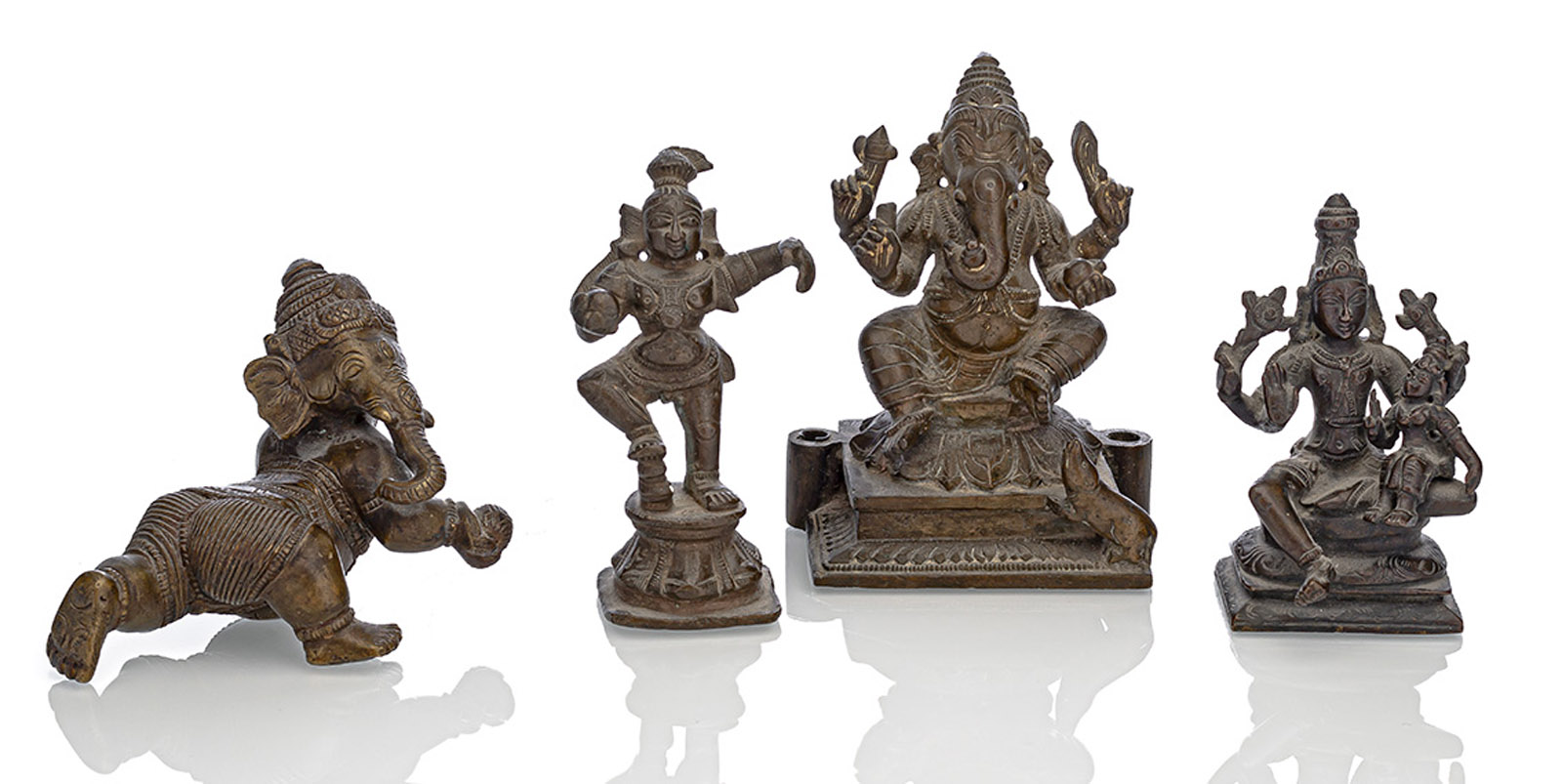 FOUR SMALL BRONZE FIGURES OF KRISHNA, UMAMAHESHVARA AND GANESHA