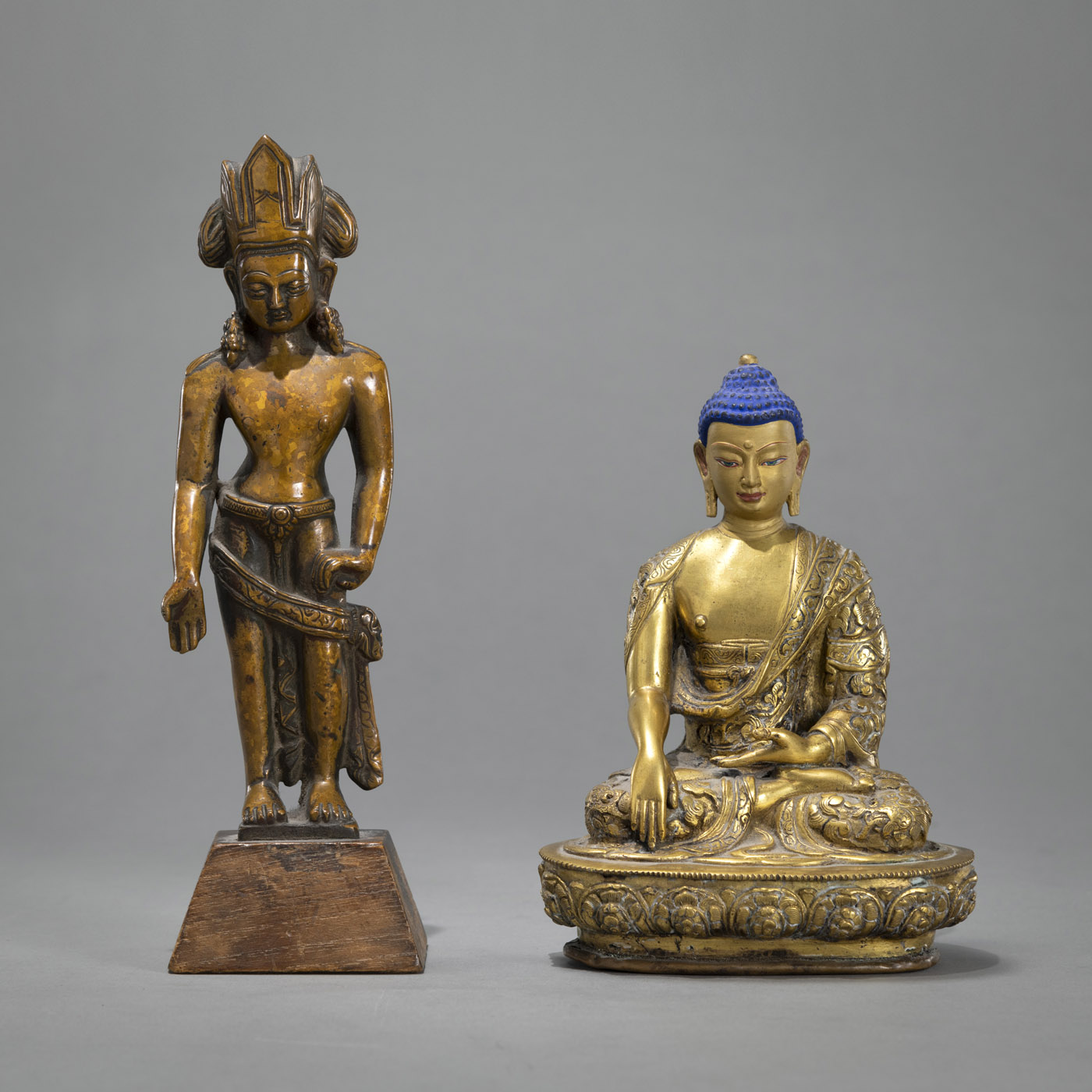 A GILT-BRONZE FIGURE OF BUDDHA SHAKYAMUNI AND A BRONZE FIGURE OF PADMAPANI IN EARLY STYLE