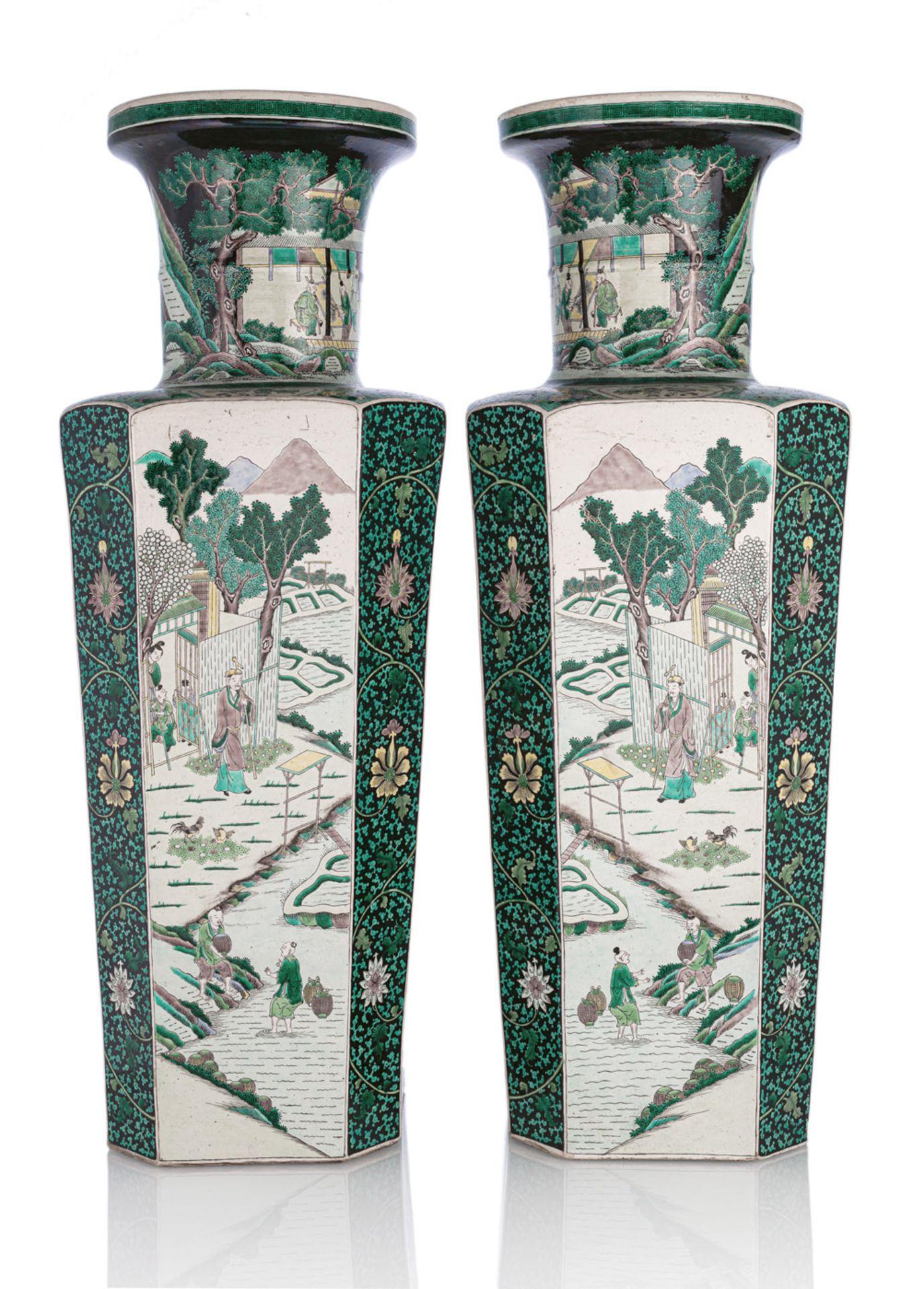 A PAIR OF LARGE OCTAGONAL 'FAMILLE NOIR' FIGURAL PORCELAIN VASES