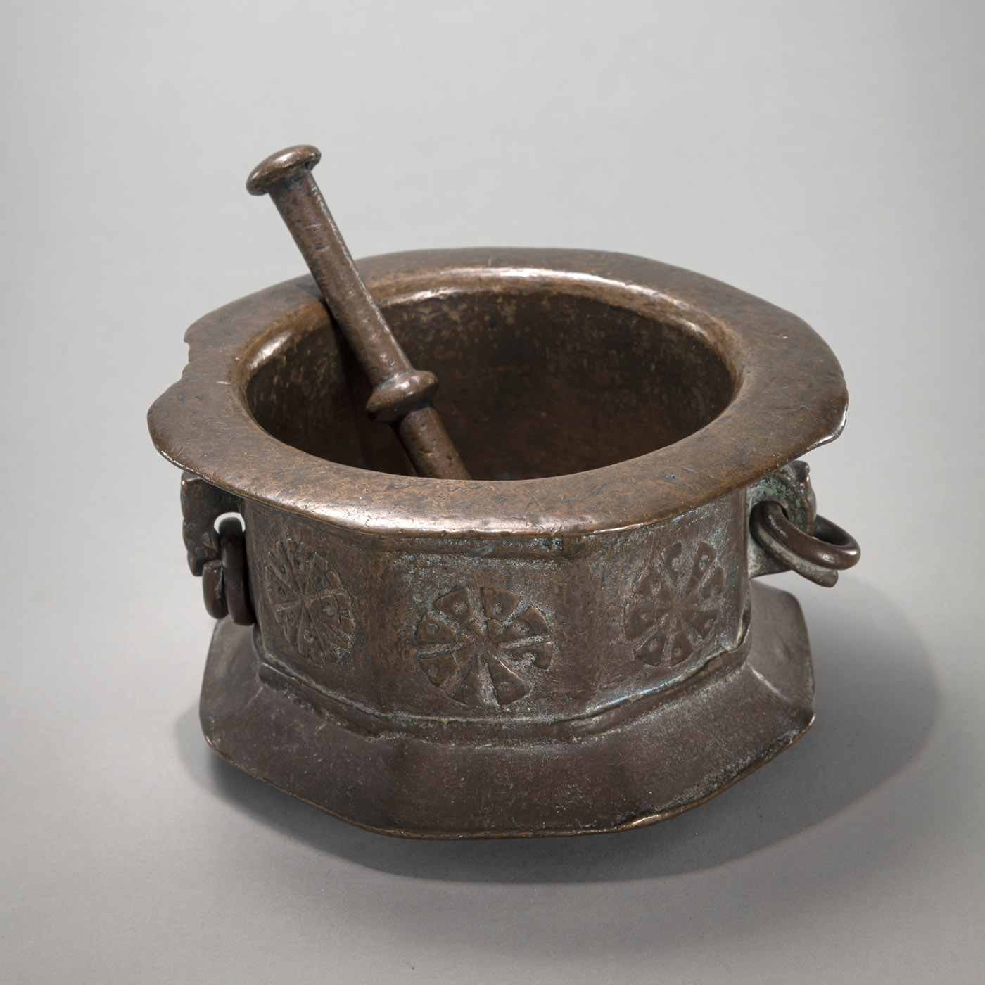 AN EARLY ISLAMIC MORTAR WITH A PESTLE