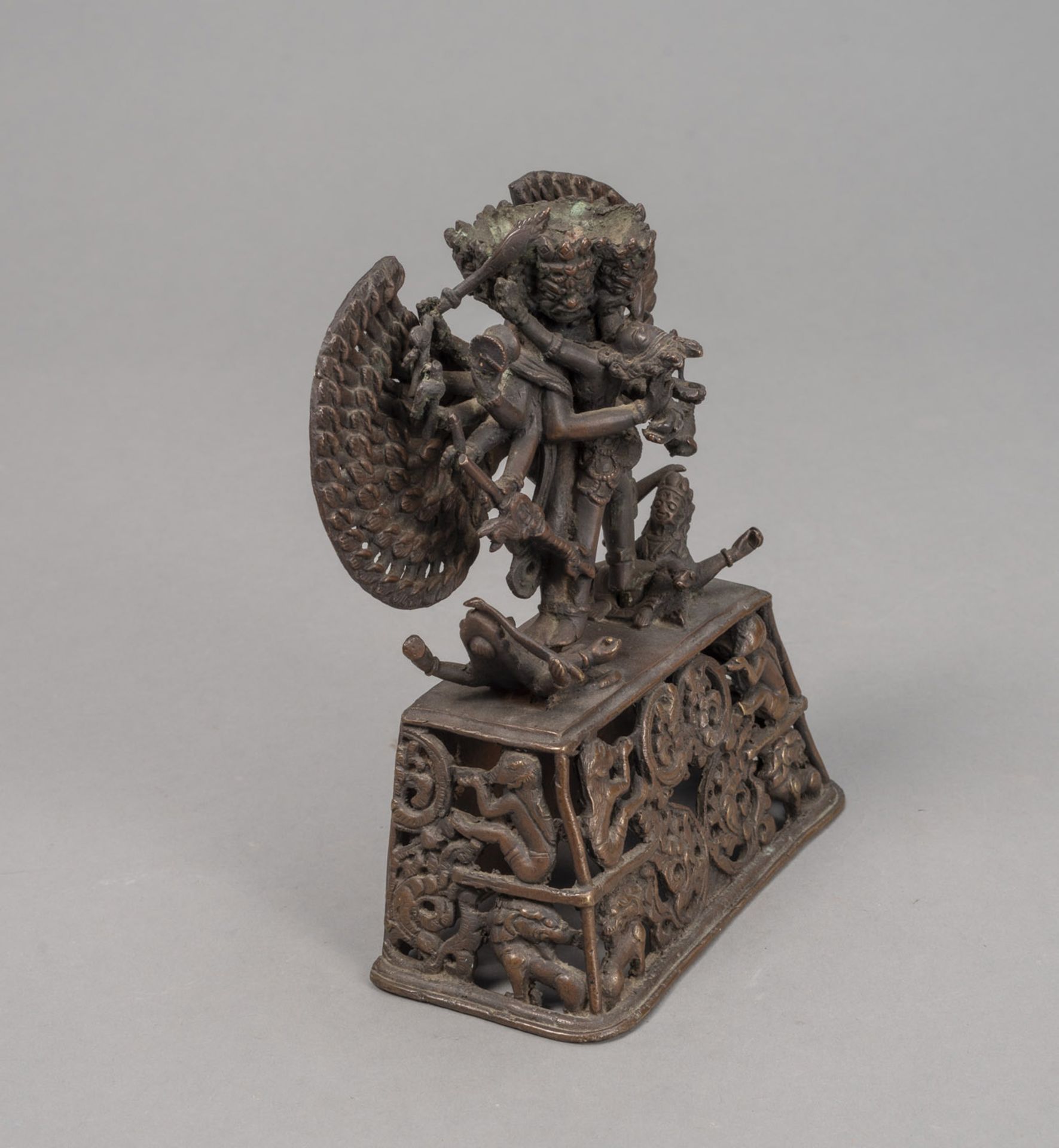 A BRONZE FIGURE OF A TANTRIC DEITY IN YAB-YUM ON AN OPENWORK PEDESTAL - Image 2 of 4