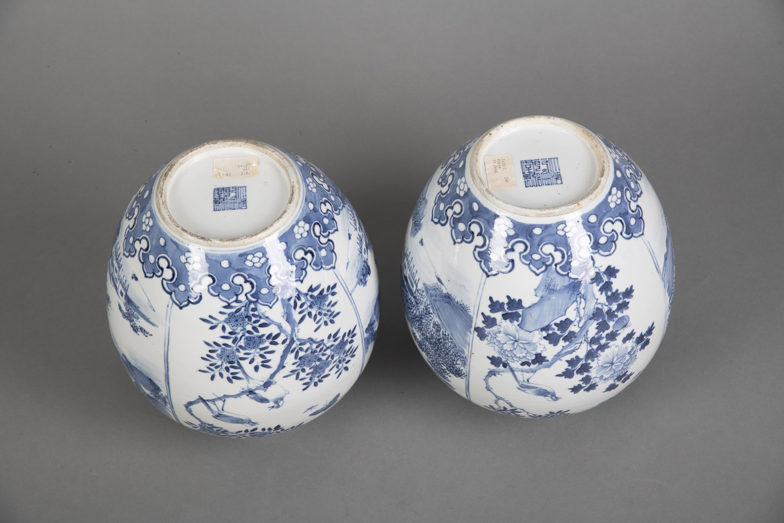 A PAIR OF BLUE AND WHITE LANDSCAPE AND FLORAL PORCELAIN VASES - Image 4 of 4
