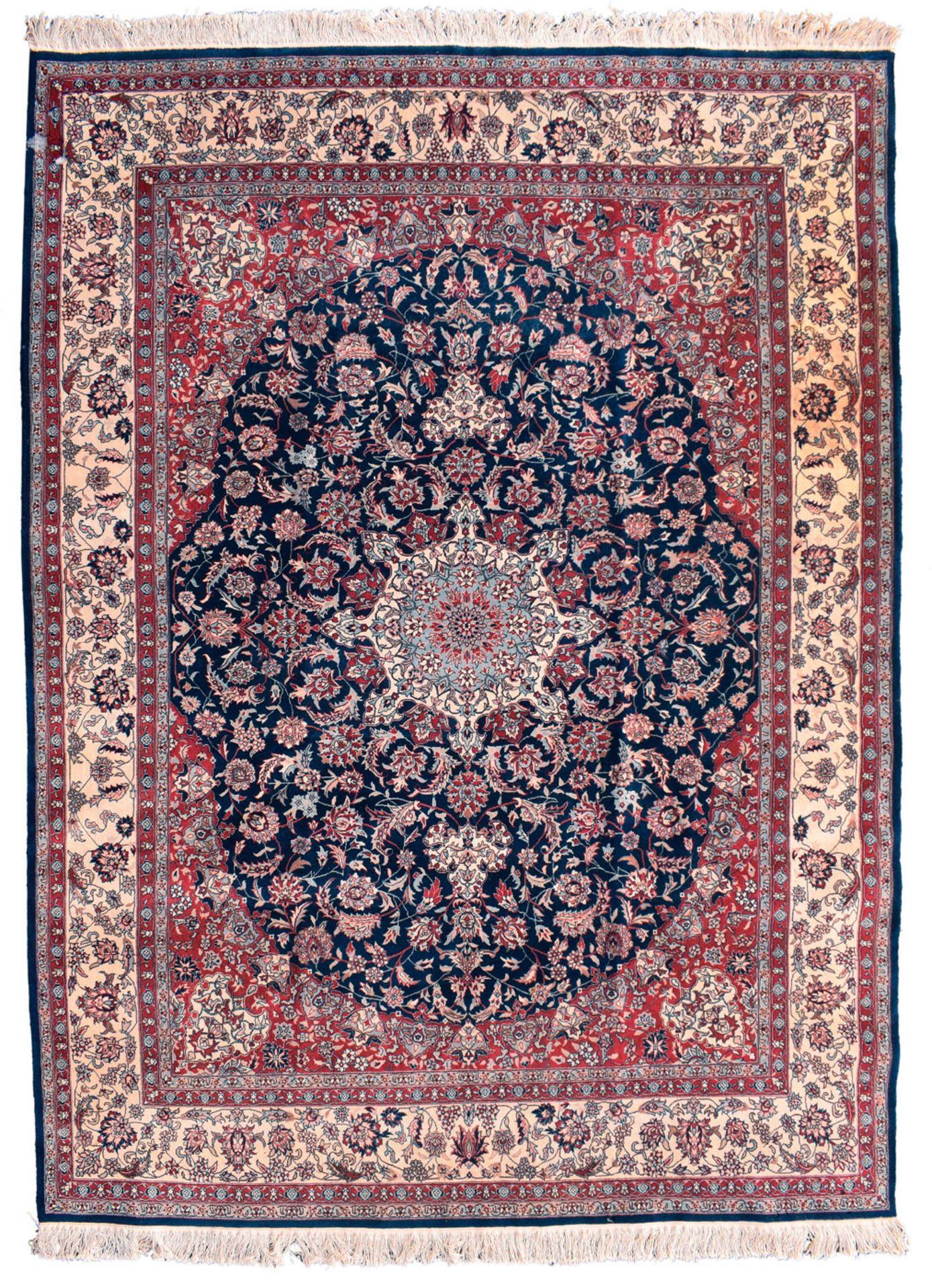 A SEMI-ANTIQUE CENTRAL MEDALLION CARPET