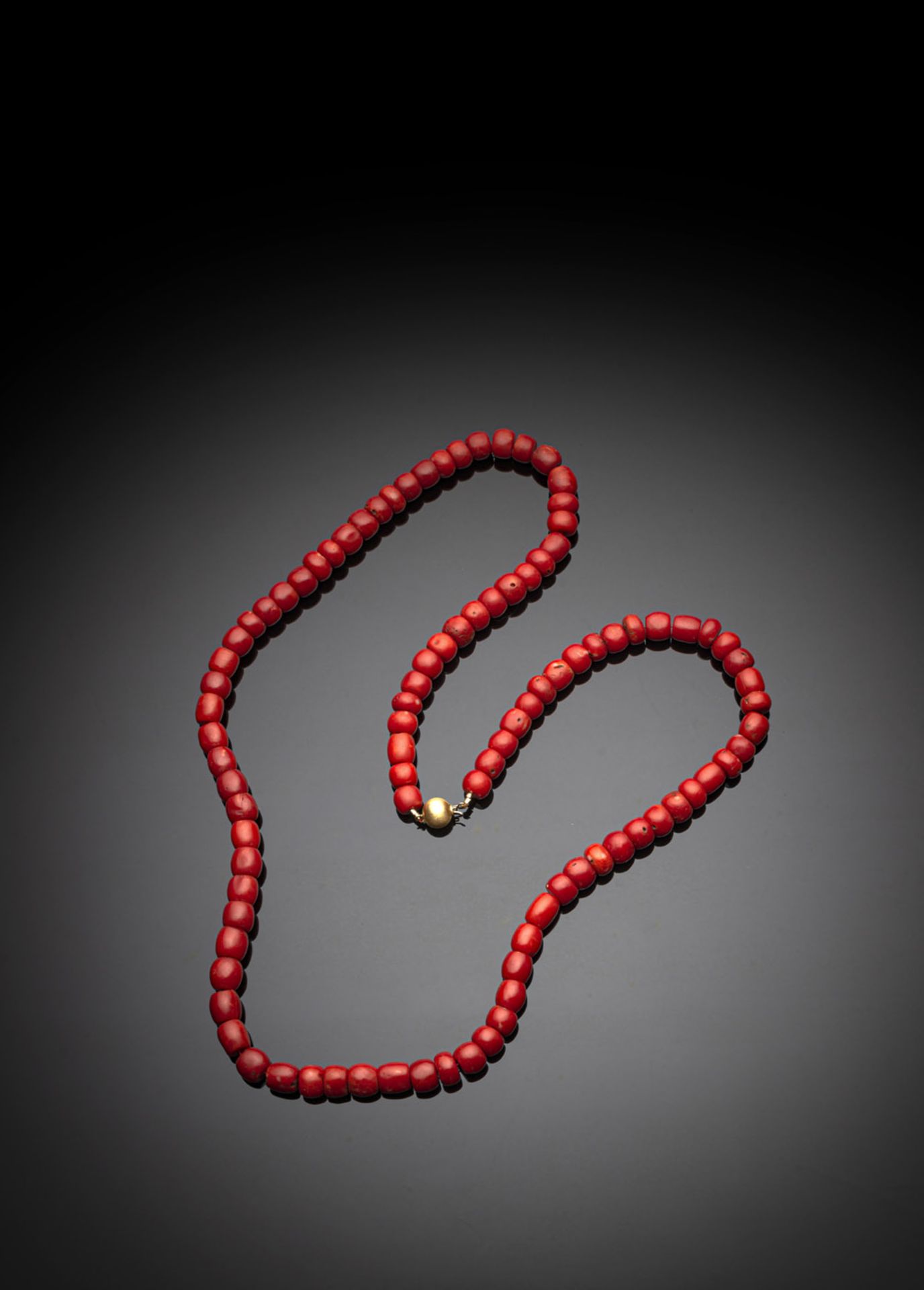 A RED CORAL BEAD NECKLACE