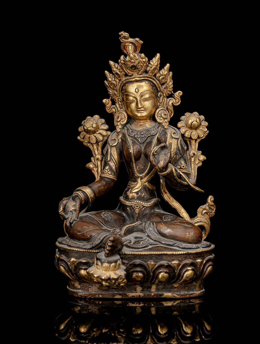 A PART-GILT BRONZE FIGURE OF SYAMATARA