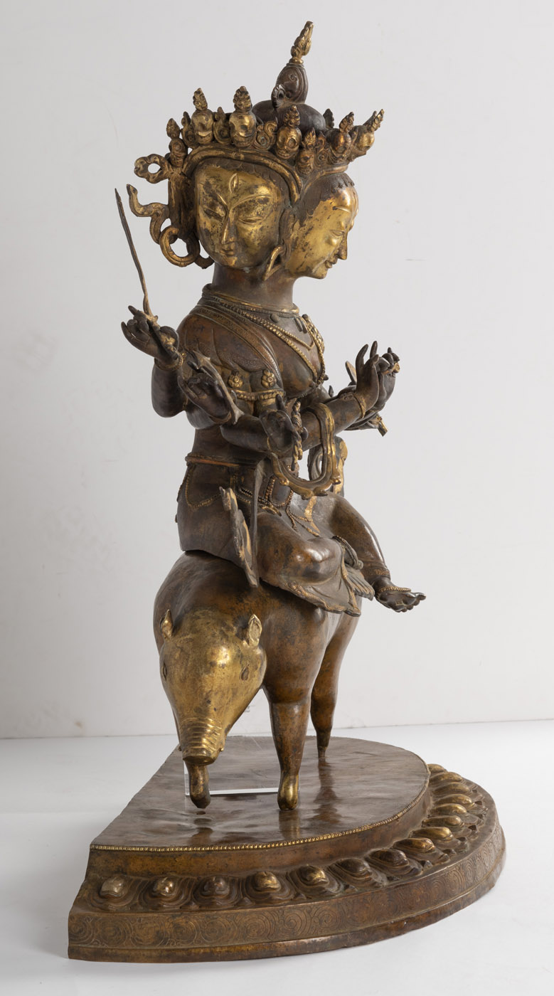 A LARGE BRONZE FIGURE OF A BUDDHIST DEITY SEATED ON A PIG - Image 3 of 4