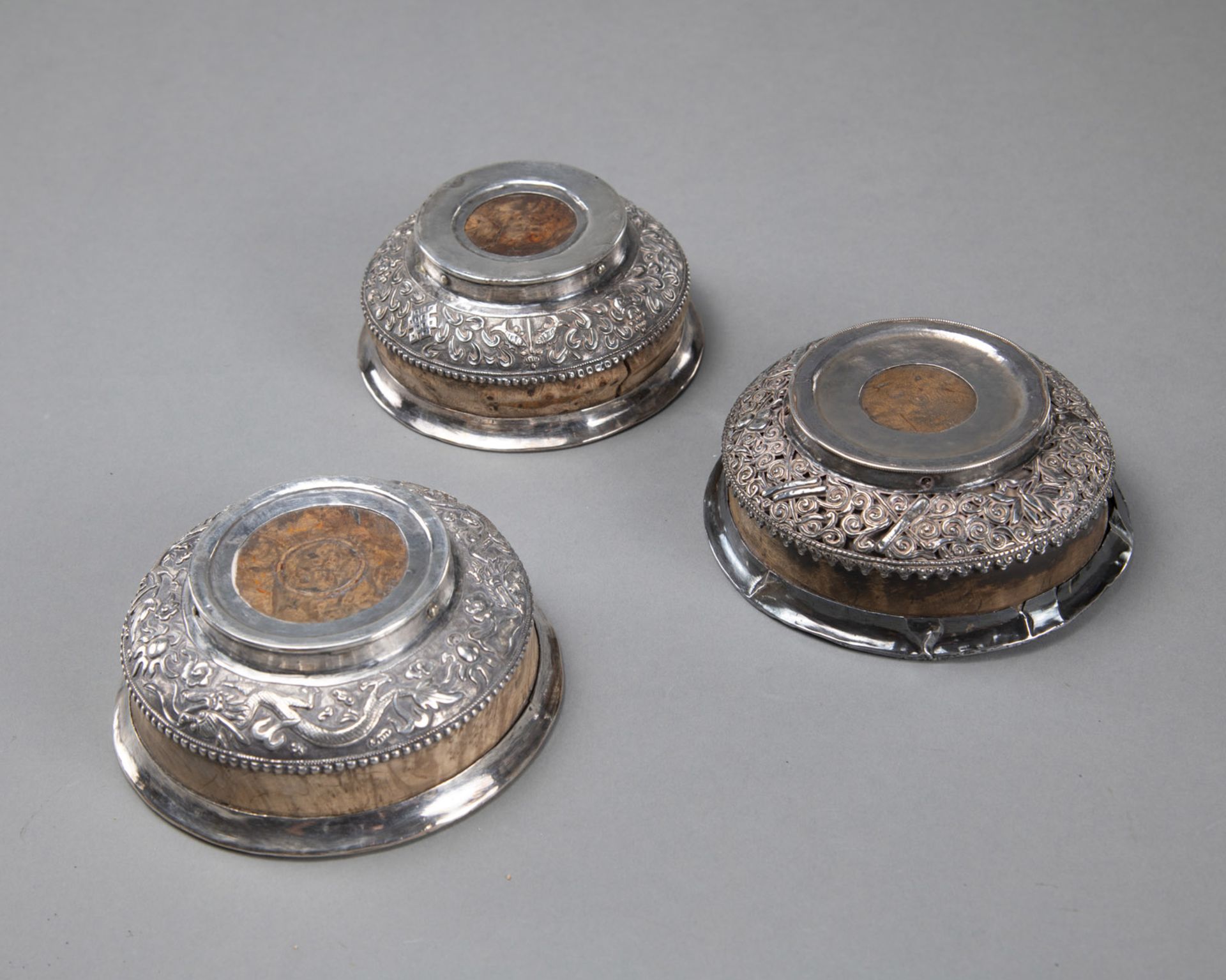 THREE ROOT WOODEN TEA BOWLS (PHORBA), PARTLY MOUNTED WITH SILVER, DECORATED WITH DRAGONS AND BUDDHI - Image 3 of 3