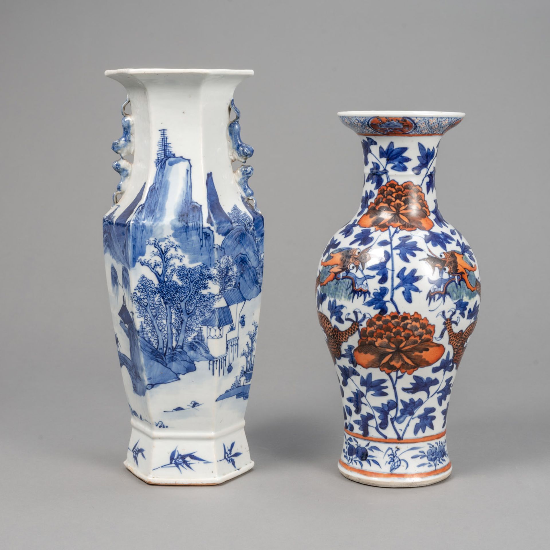 A HEXAGONAL BLUE AND WHITE LANDSCAPE PORCELAIN VASE AND A BLUE AND RED DRAGON VASE