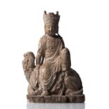 Holzfigur des Guanyin auf einem Löwen