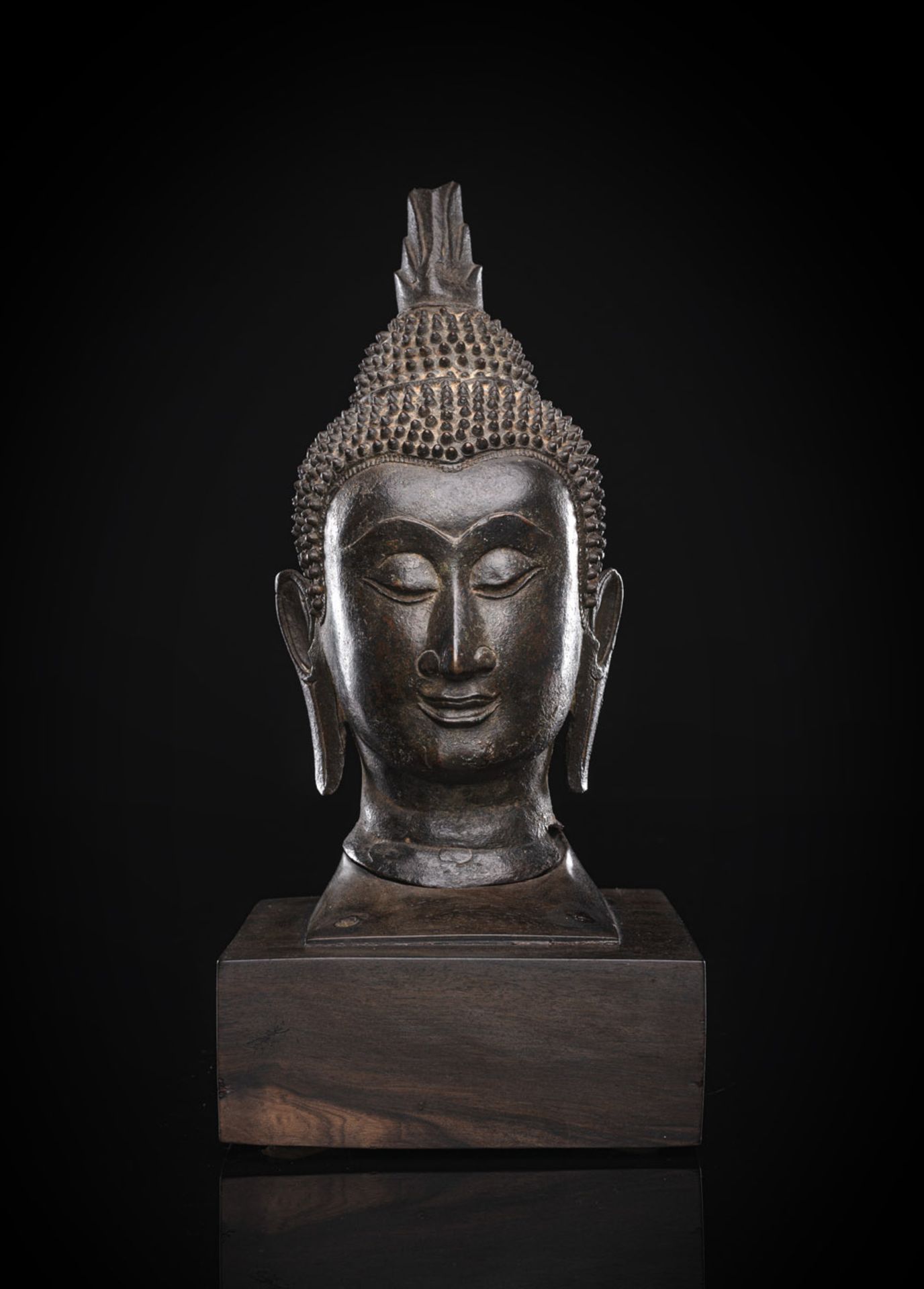 A BRONZE HEAD OF BUDDHA SHAKYAMUNI