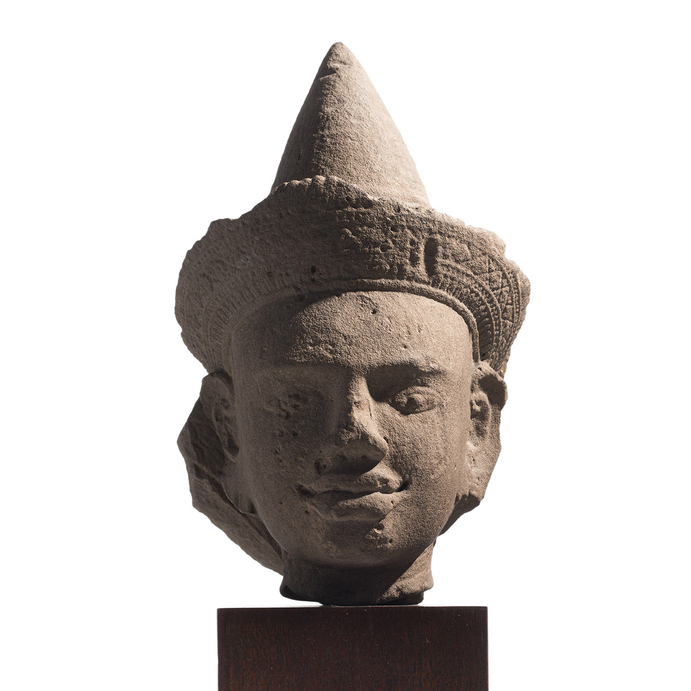 A SANDSTONE HEAD OF BUDDHAMUCHALINDA