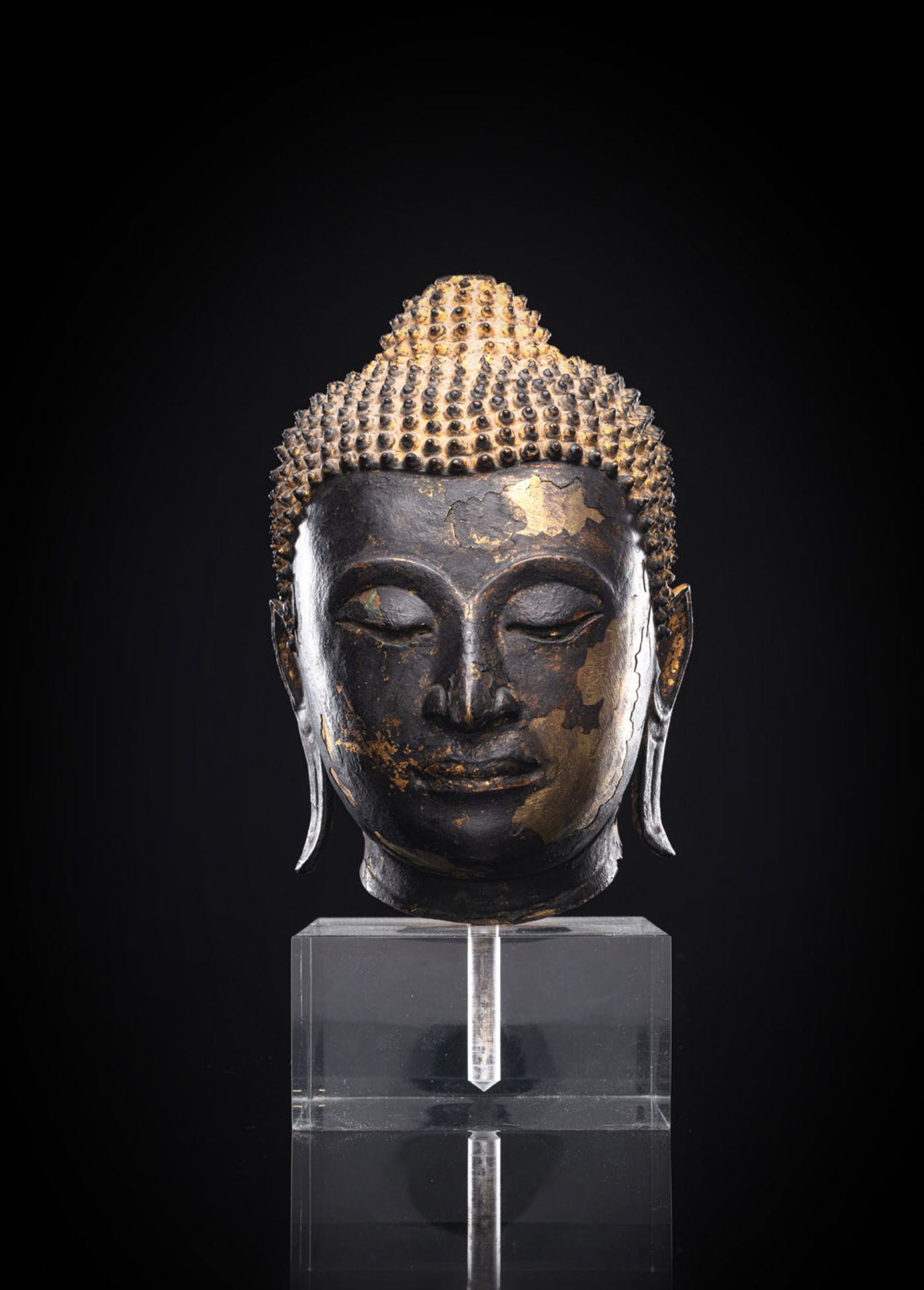 A BRONZE HEAD OF BUDDHA SHAKYAMUNI