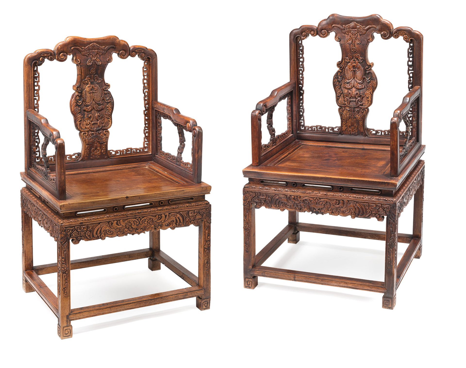 A PAIR OF CARVED RELIEF AUSPICIOUS BATS AND FISH ARMCHAIRS
