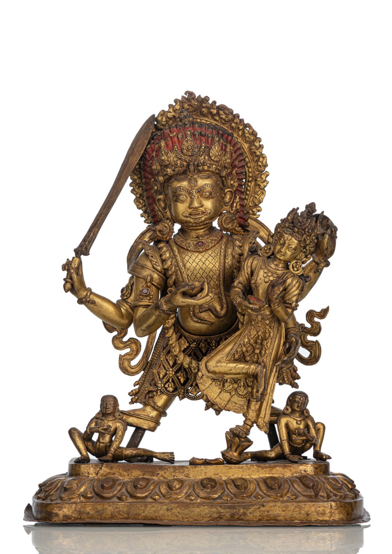 A LARGE AND MASSIVE GILT-BRONZE GROUP OF BHAIRAVA