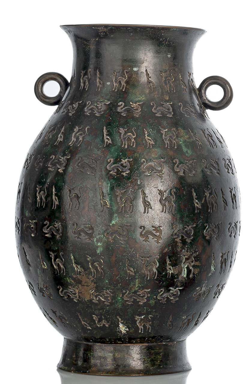 A BRONZE VASE IN ARCHAIC STYLE