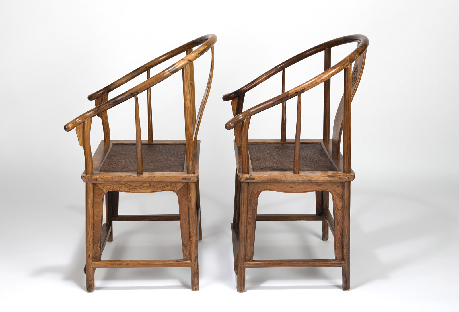 A PAIR OF HUANGHUALI WOOD 'CHILONG' DRAGON MEDALLION HORSESHOE-BACK ARMCHAIRS 'QUANYI' - Image 6 of 8