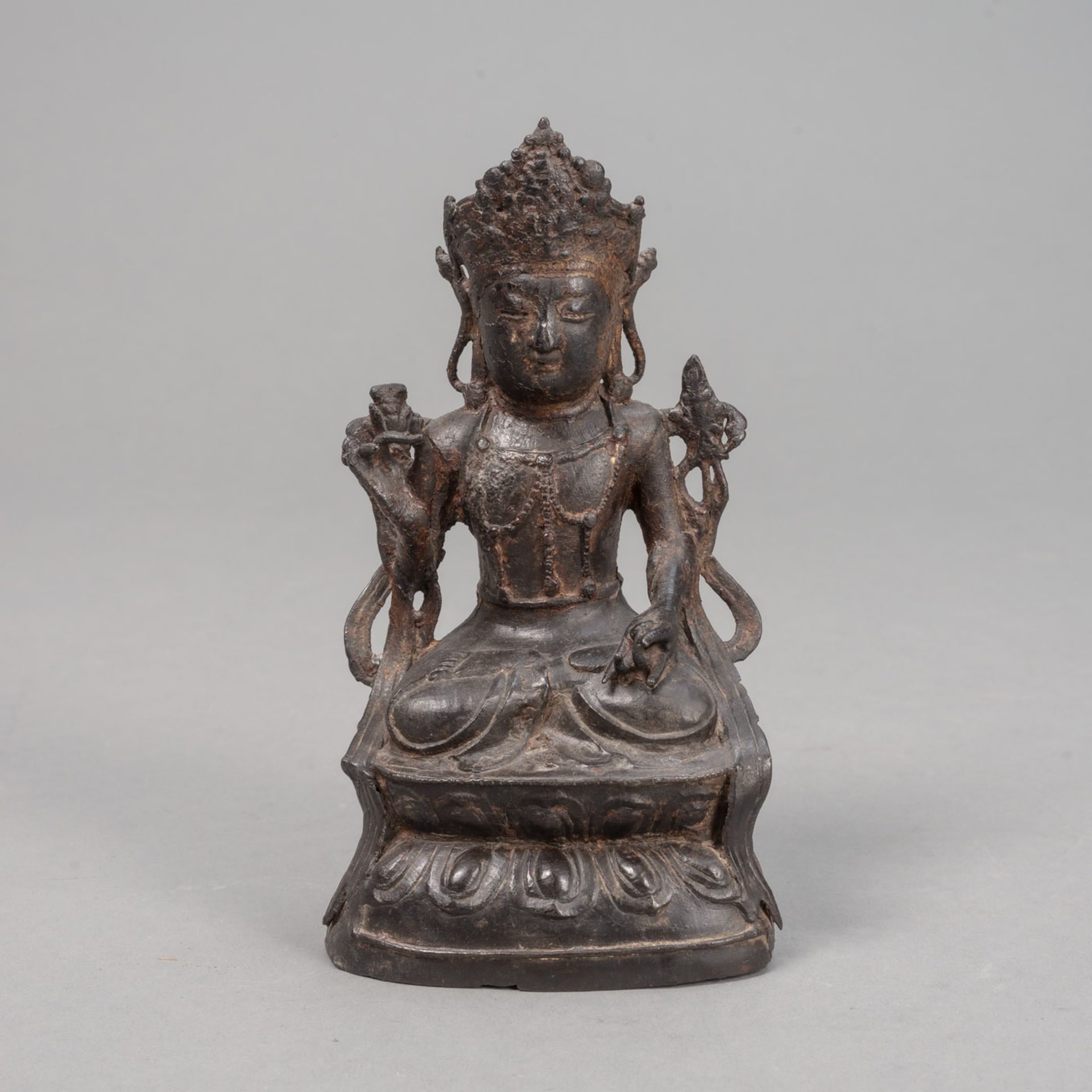 A BRONZE FIGURE OF CROWNED GUANYIN