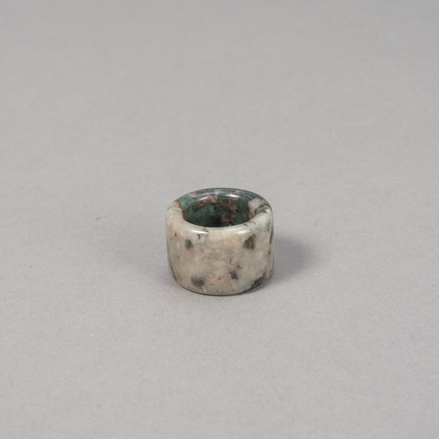 ARCHER'S RING MADE OF GREEN-GREY MOTTLED STONE