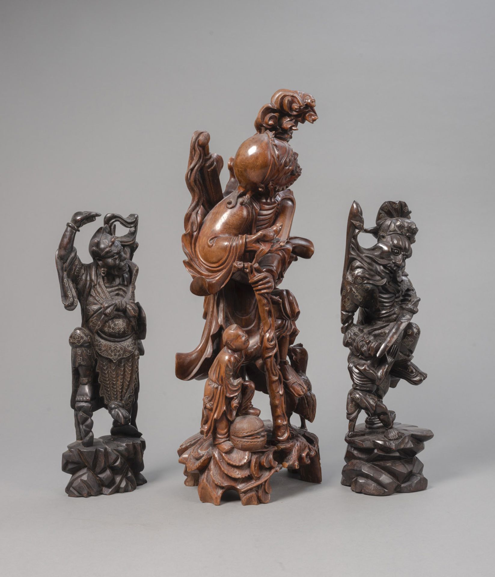 THREE WOOD CARVINGS OF TAOIST FIGURES, INCLUDING LI TIEGUAI AND ZHONG KUI, PARTLY INLAID WITH METAL - Image 2 of 5