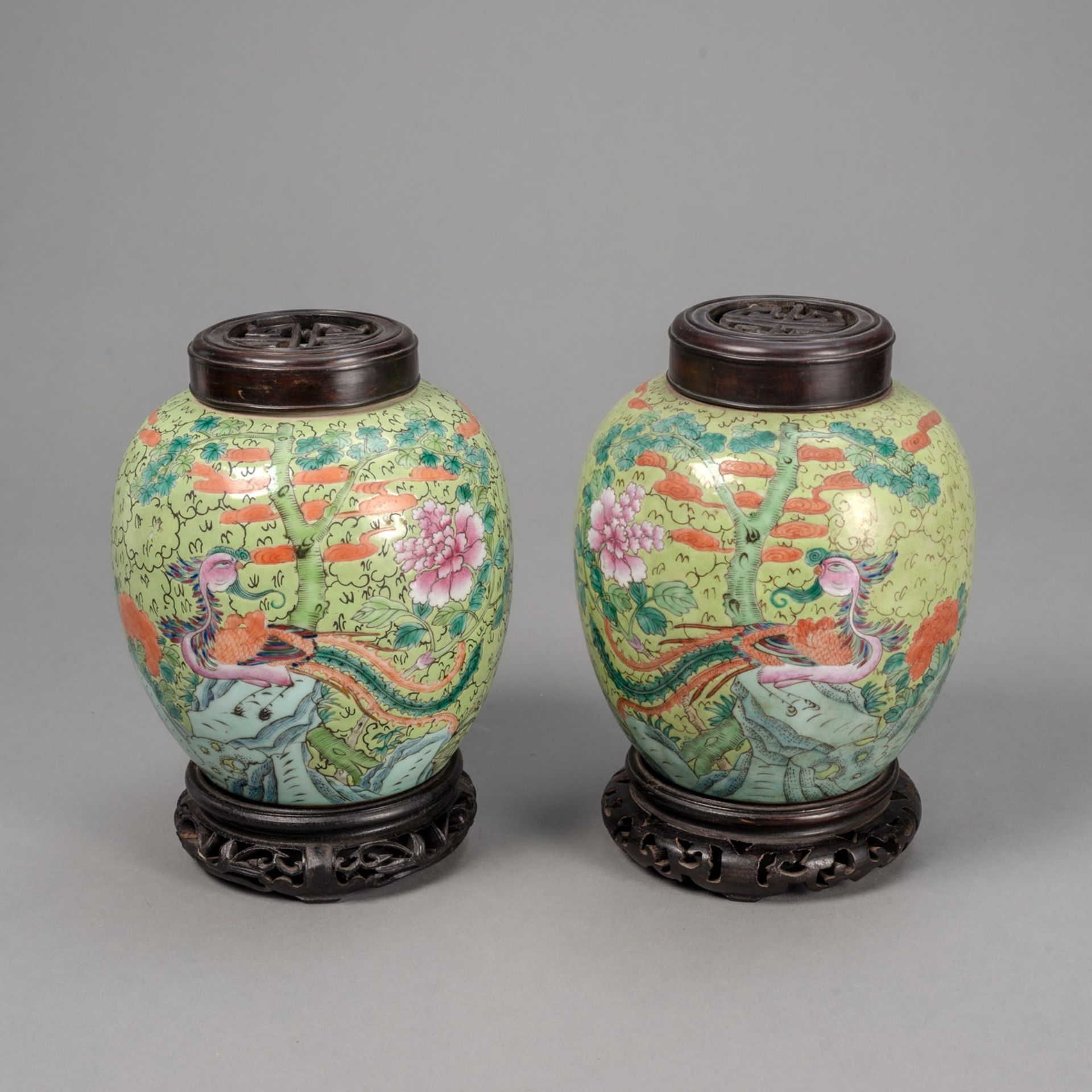 A PAIR OF GREEN-GROUND PORCELAIN GINGER JARS