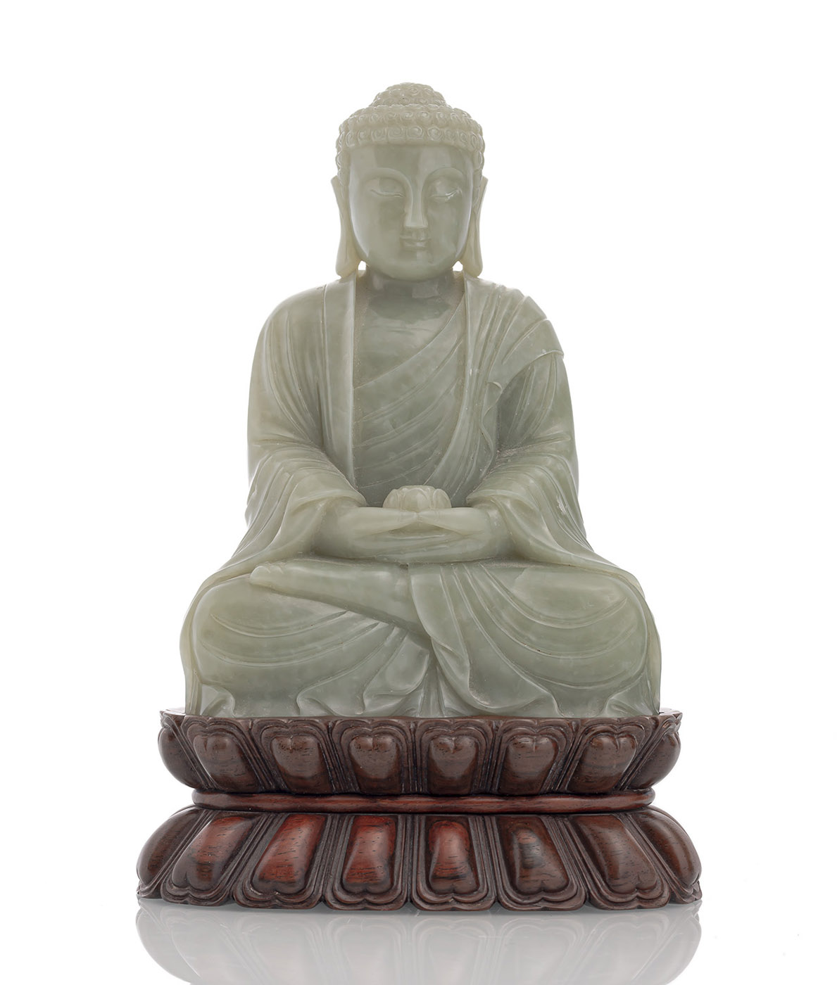 A WELL CARVED JADE FIGURE OF SEATED BUDDHA HOLDING A LOTOS BOWL