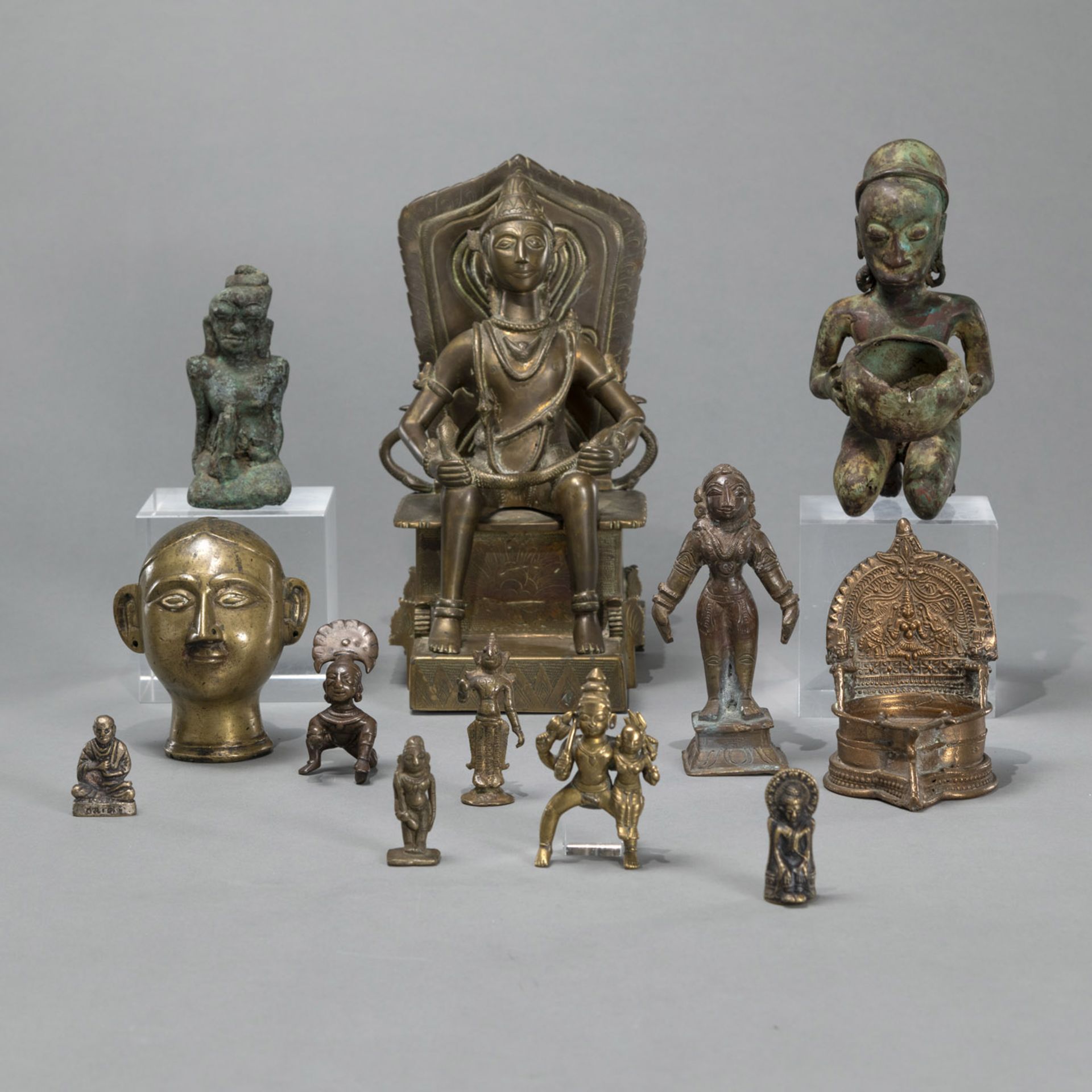 A GROUPE OF BRONZE FIGURES