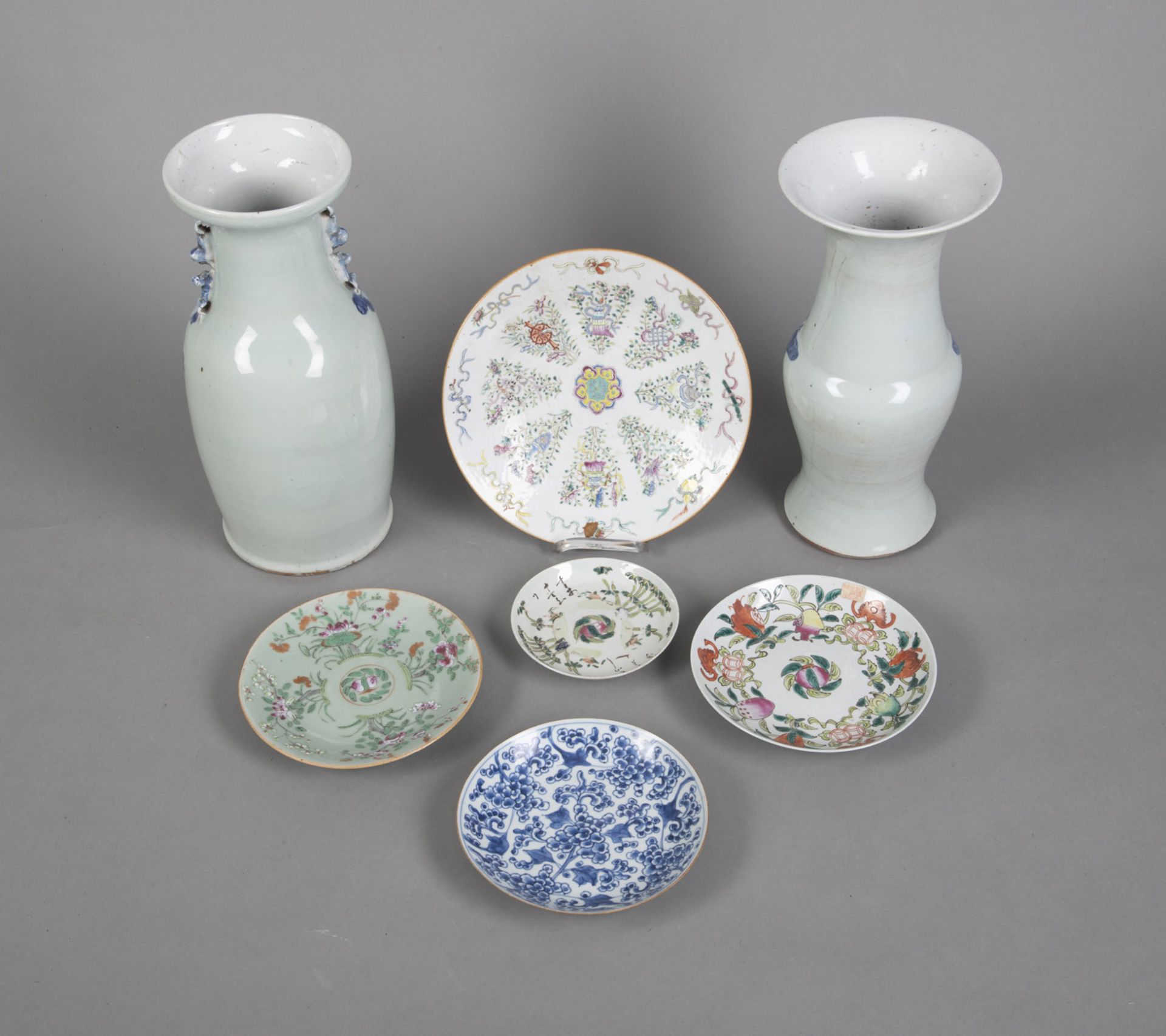 FIVE PORCELAIN PLATES AND TWO VASES PAINTED WITH POLYCHROME TREASURE AND FLOWER DECORATION - Image 2 of 3