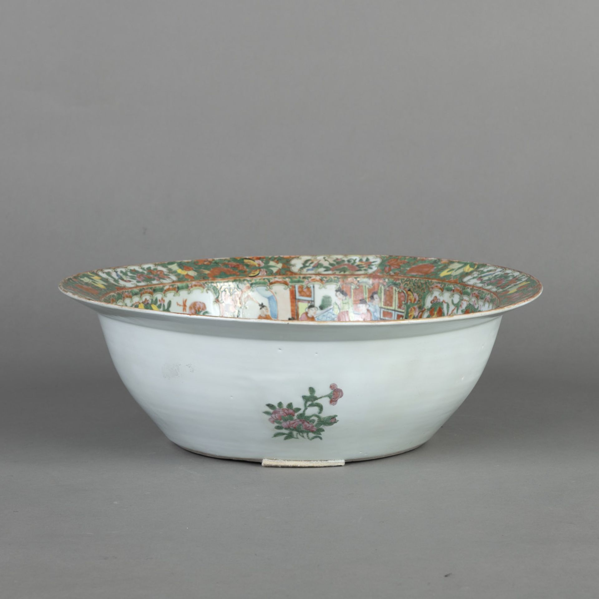 A LARGE 'FAMILLE ROSE' FIGURAL PORCELAIN BASIN