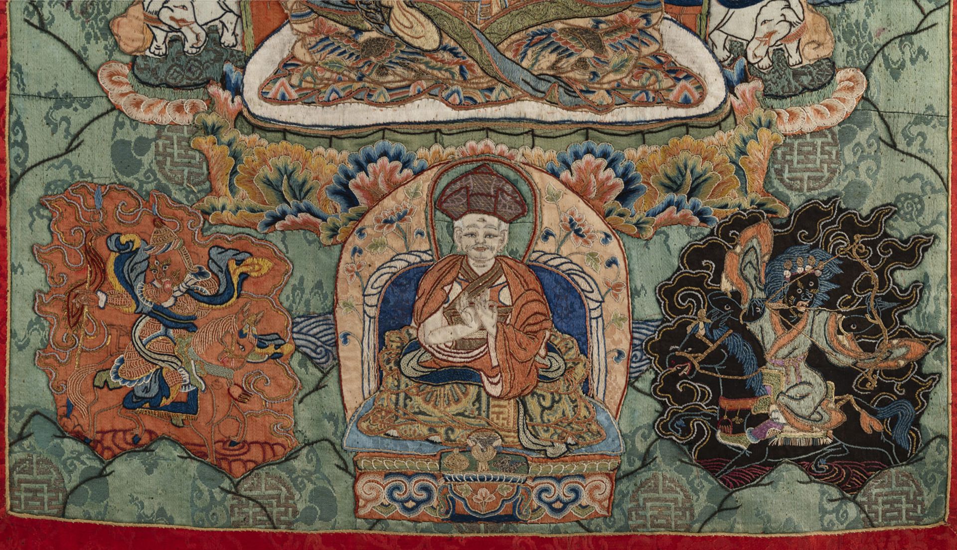 A RARE AND FINE ﻿SILK APPLICATION THANGKA DEPICTING PADMASAMBHAVA - Image 6 of 8