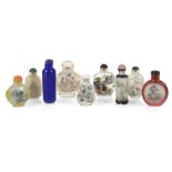 Neun Snuffbottles aus Glas, teilw. innen bemalt mit Schmetterlingen, Figuren und Landschaften