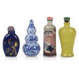 Vier Snuffbottles aus Porzellan