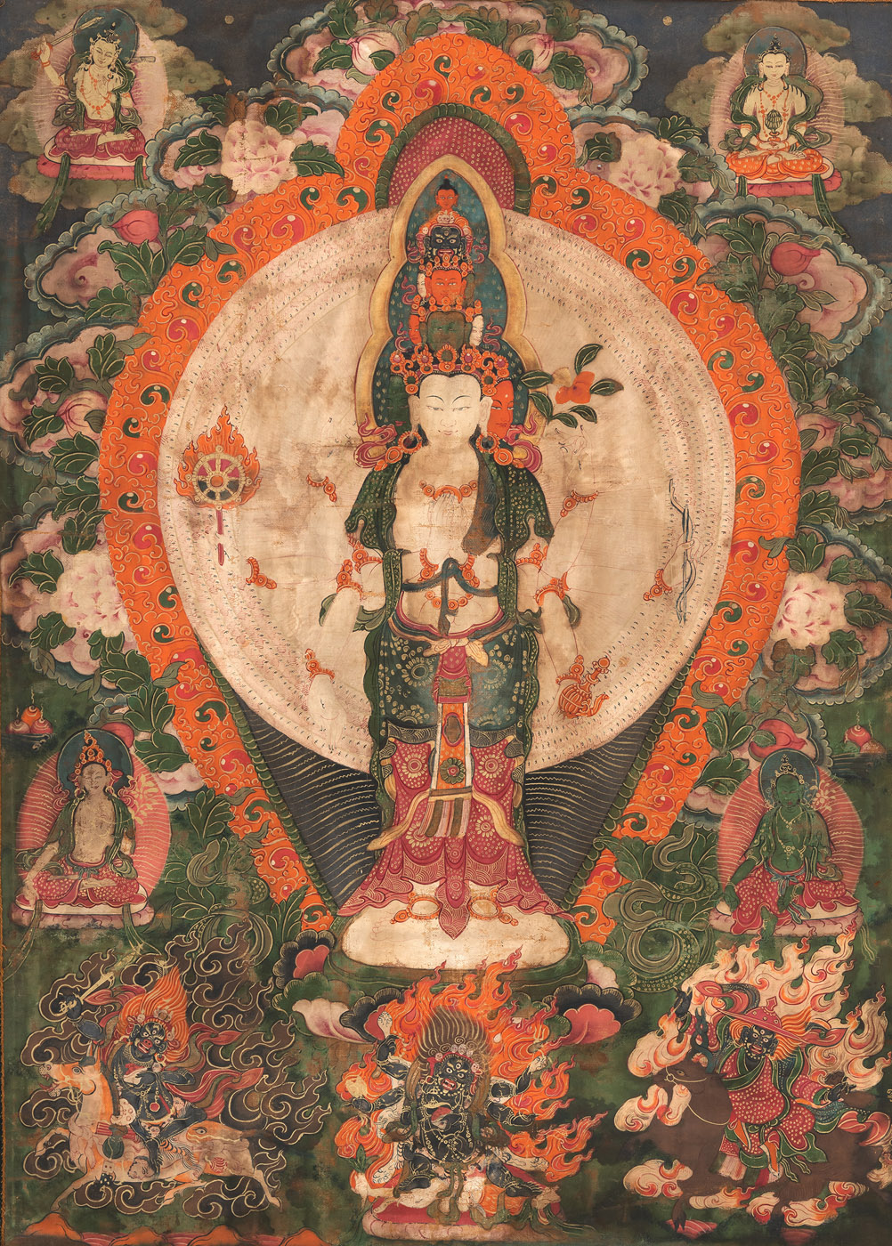 A GROUP OF FOUR THANGKA OR TSAGLI, WITH VAISHRAVANA AND AVALOKITESHVARA, PARTLY MOUNTED