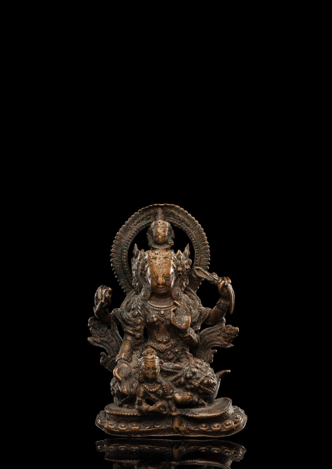 A COPPER FIGURE OF A TANTRIC DEITY