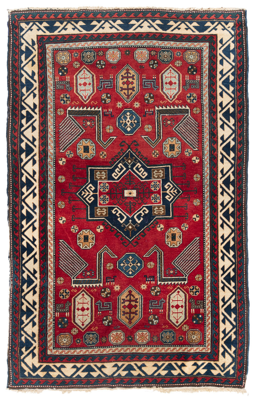 A SEMI ANTIQUE CARPET WITH CAUCASIAN FAKHRALO DESIGN