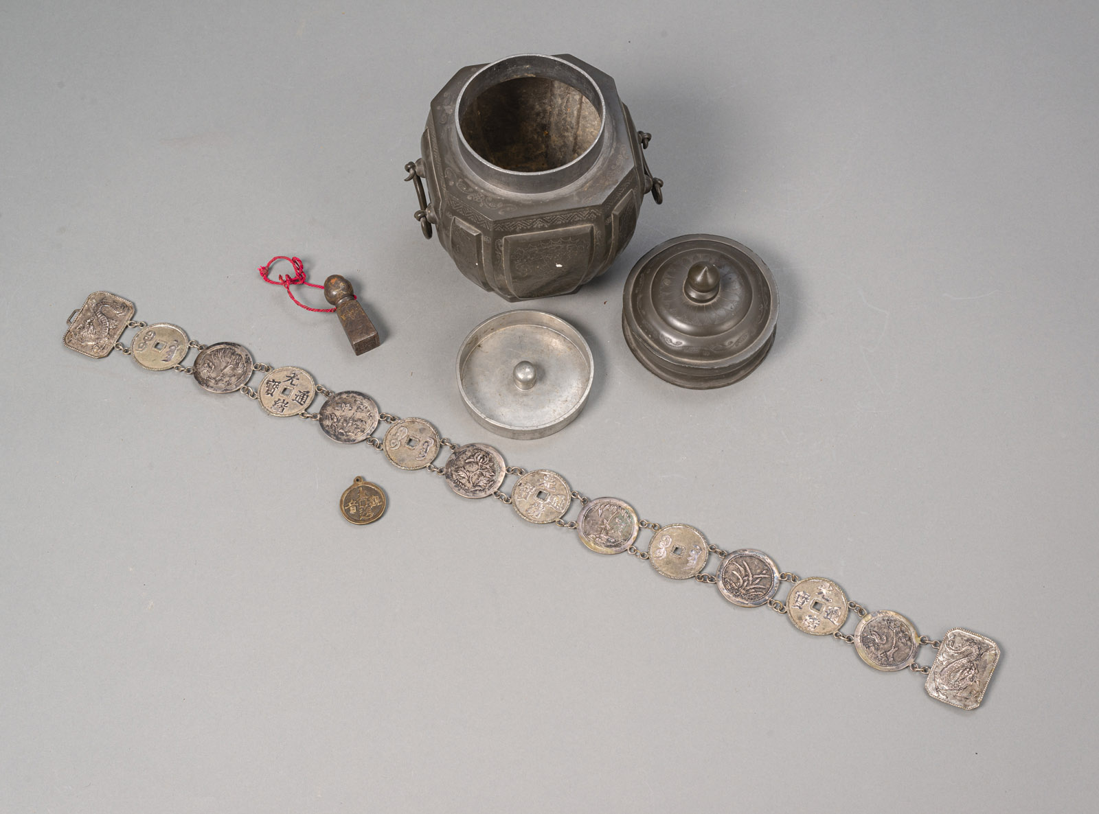 A PEWTER BOX AND COVER, A COIN SILVER PLATE BELT, A MEDALLION PENDANT AND A SEAL - Image 2 of 4