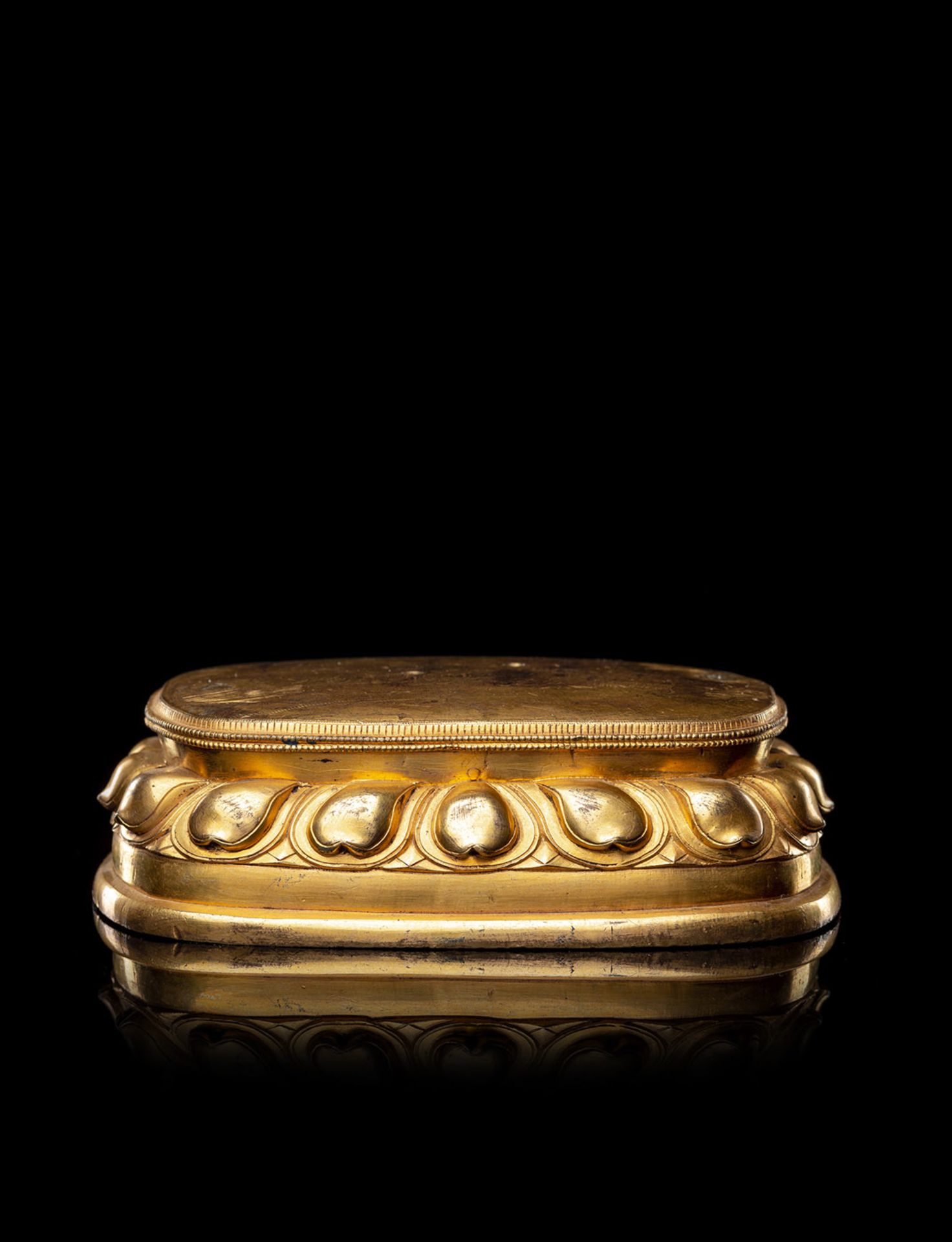 A FINE GILT-BRONZE LOTUS BASE