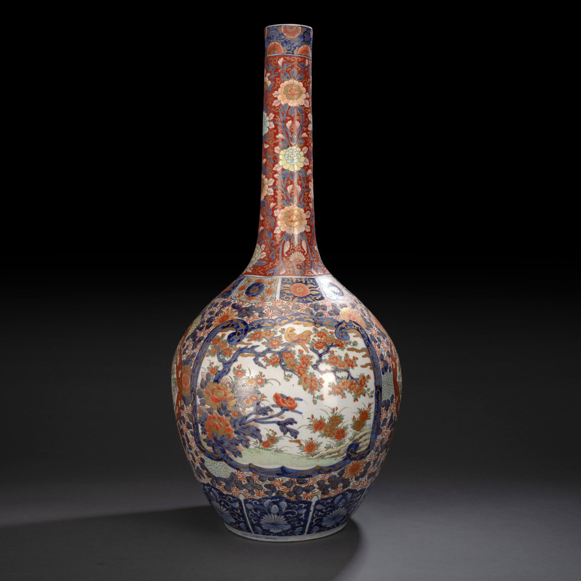 A LARGE NARROW-NECKED IMARI PORCELAIN VASE DECORATED WITH BIRDS AND FLOWERS