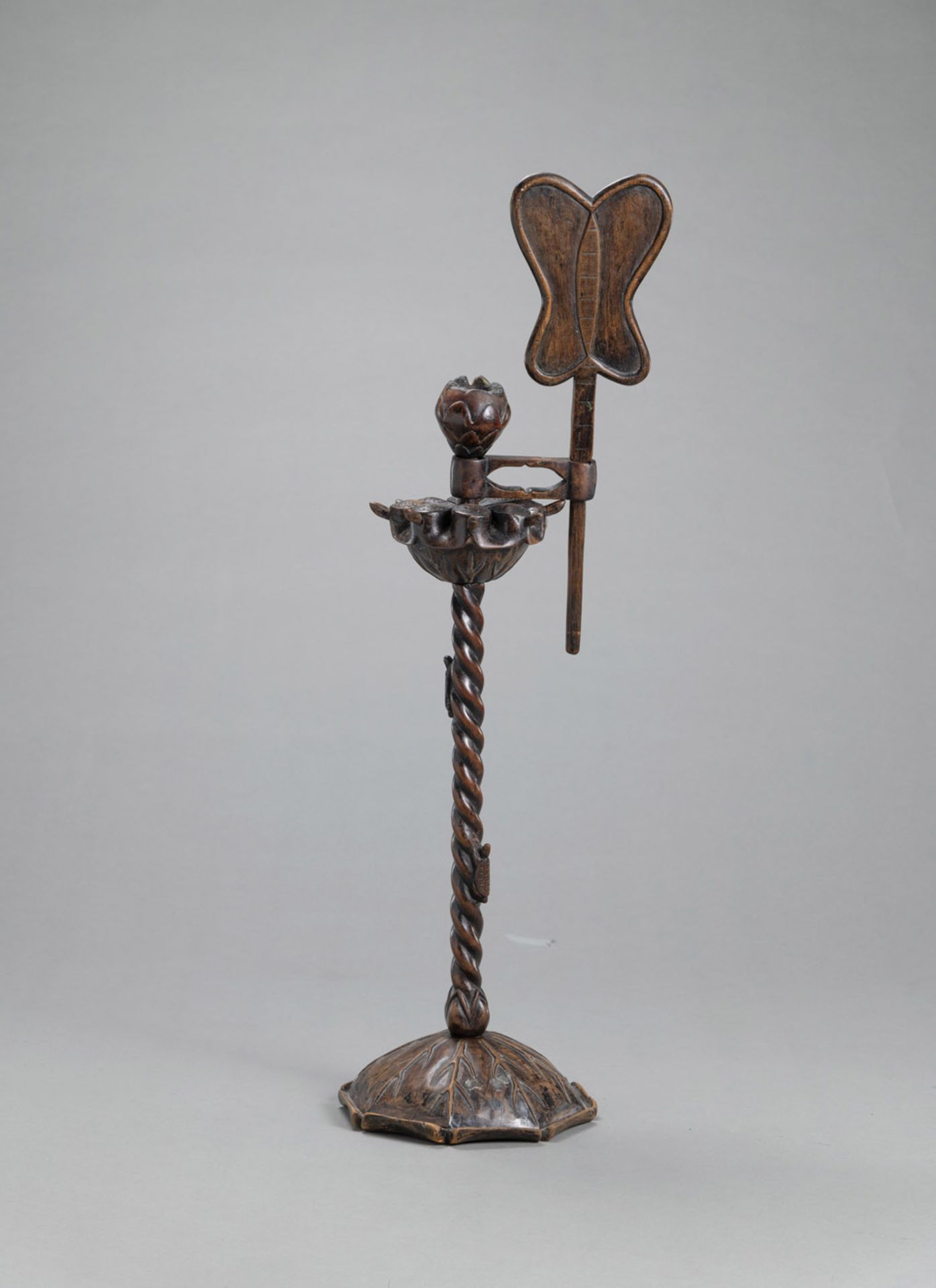 A MULTI-PART WOODEN CANDLESTICK  IN THE SHAPE OF A LOTUS DECORATED WITH SMALL TURTLES AND A LEAF FA - Image 2 of 3