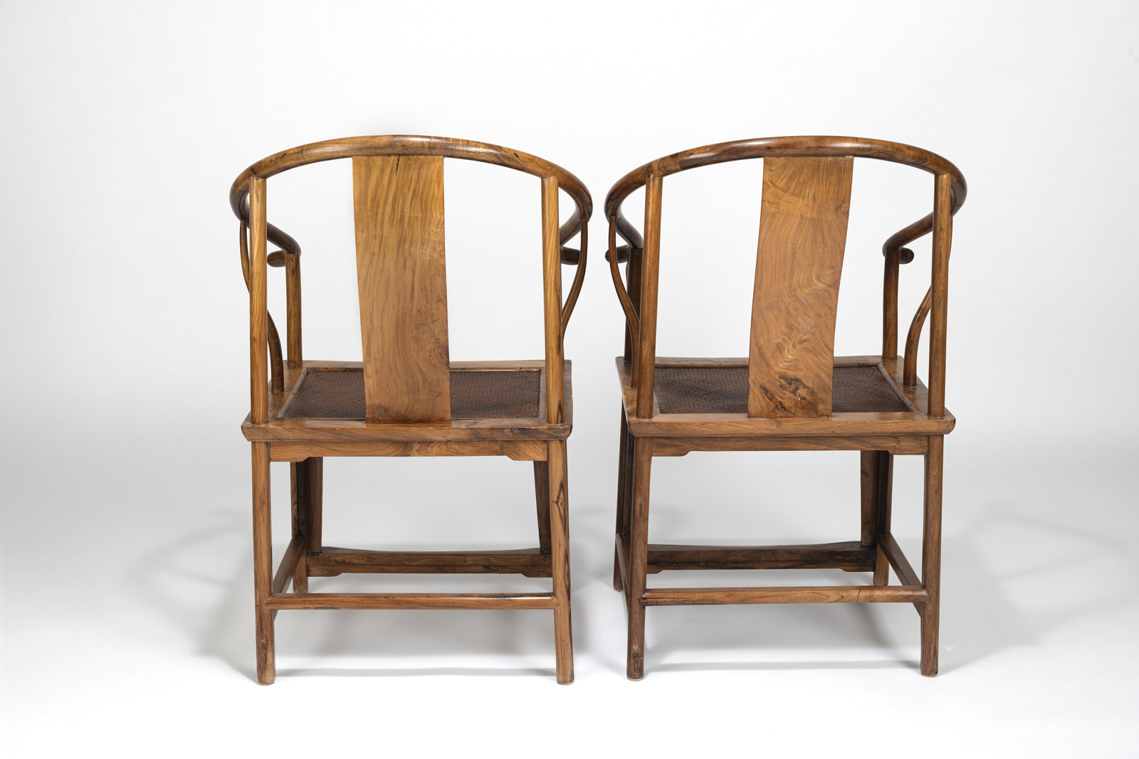 A PAIR OF HUANGHUALI WOOD 'CHILONG' DRAGON MEDALLION HORSESHOE-BACK ARMCHAIRS 'QUANYI' - Image 7 of 8