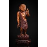 Skulptur des Buddha als Knabe mit goldener- und roter Lackfassung