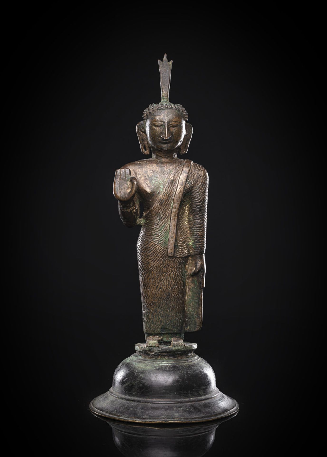 A BRONZE FIGURE OF BUDDHA SHAKYAMUNI