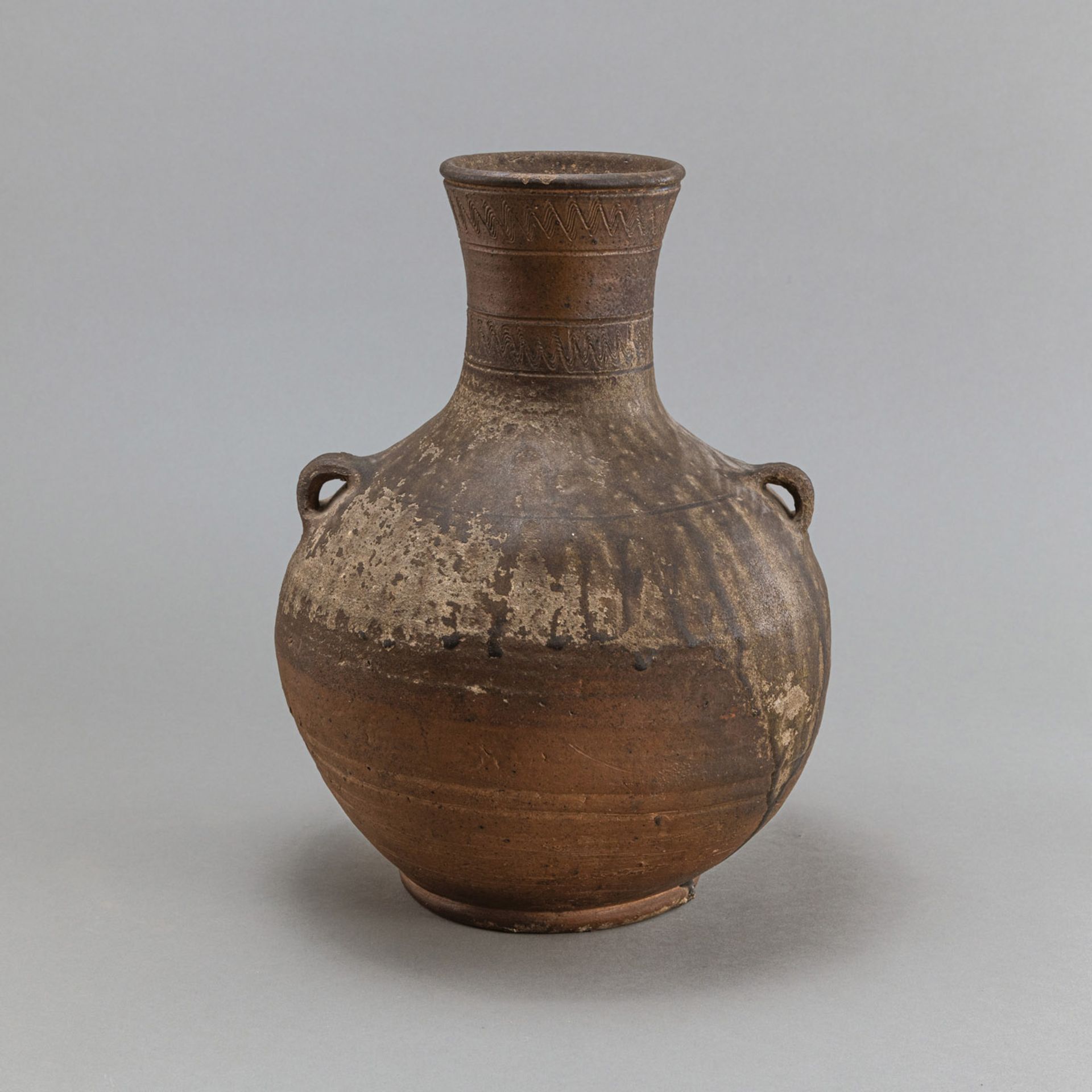 A LUGGED CERAMIC VASE