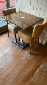 Square wooden table with two leather effect chairs