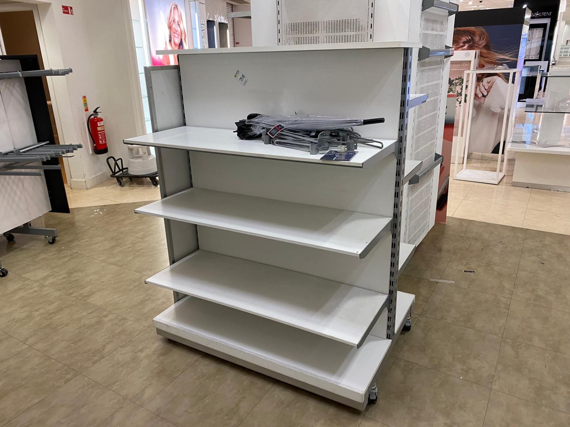 Metal Framed Shelving Unit With White Shelving includes contents