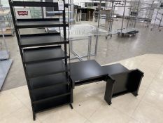 black shelving unit and display tables