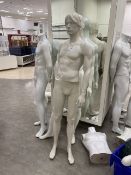 assortment of free standing mannequins with glass bases