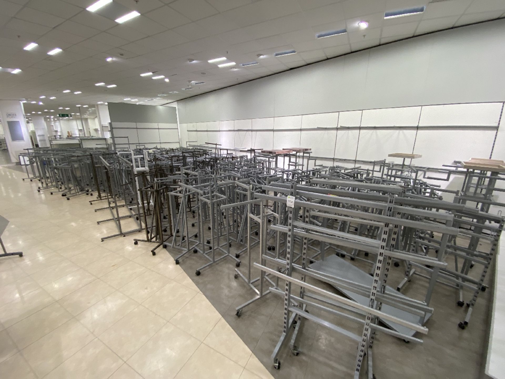 large quantity of clothes rails and display rails