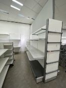Large partition wall with shelving